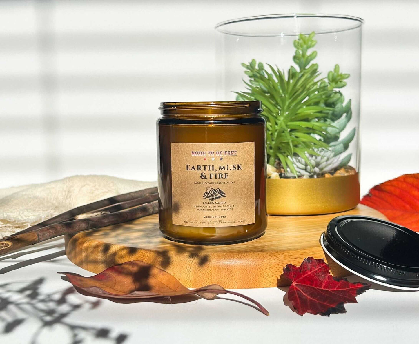 earthy musk candle with warm amber and smoke aroma