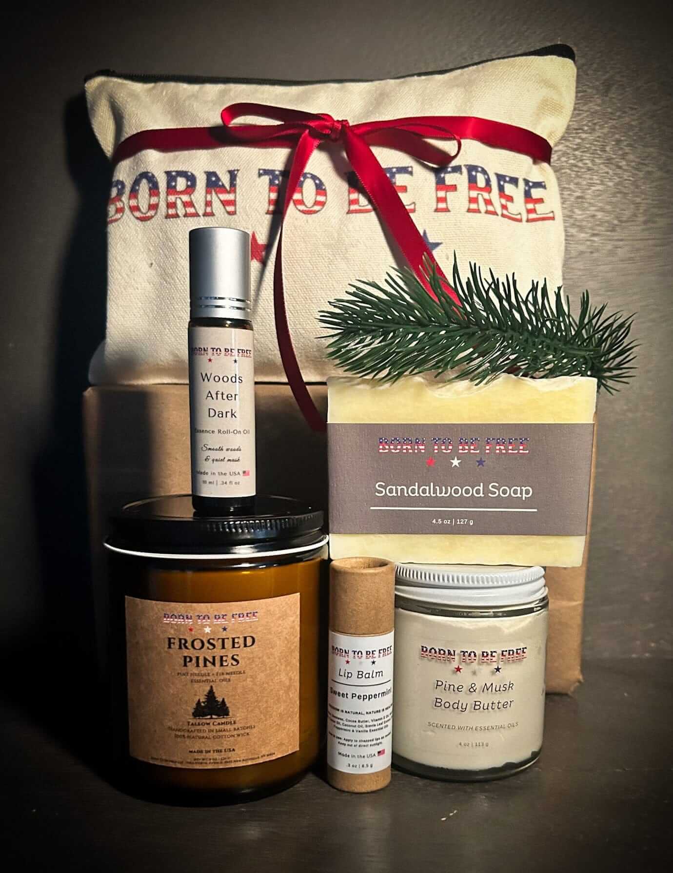 Winter Woods Holiday Bundle displayed with Born To Be Free travel pouch and toxin-free winter skincare collection.