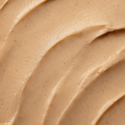 Close-up of creamy texture of Cinnamon Spice Lip Balm, showcasing its rich and nourishing formula.