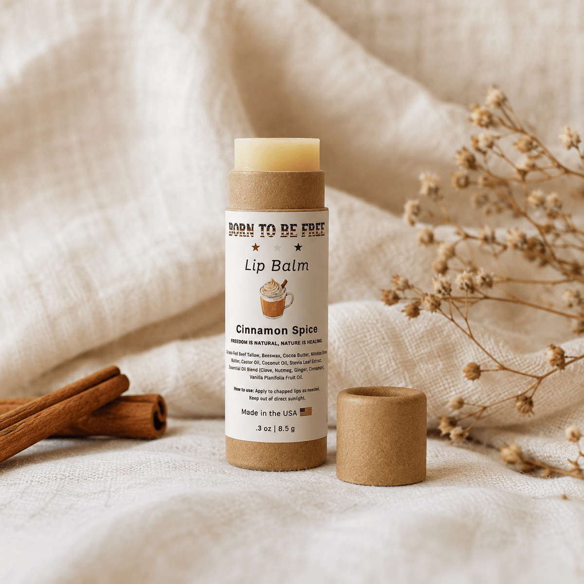Cinnamon Spice Lip Balm in eco-friendly packaging, showcasing natural ingredients and cozy autumn vibes.