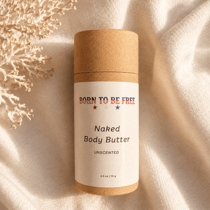 Pregnancy Belly Balm with Tallow for Stretch Mark Support tube on a soft fabric background.