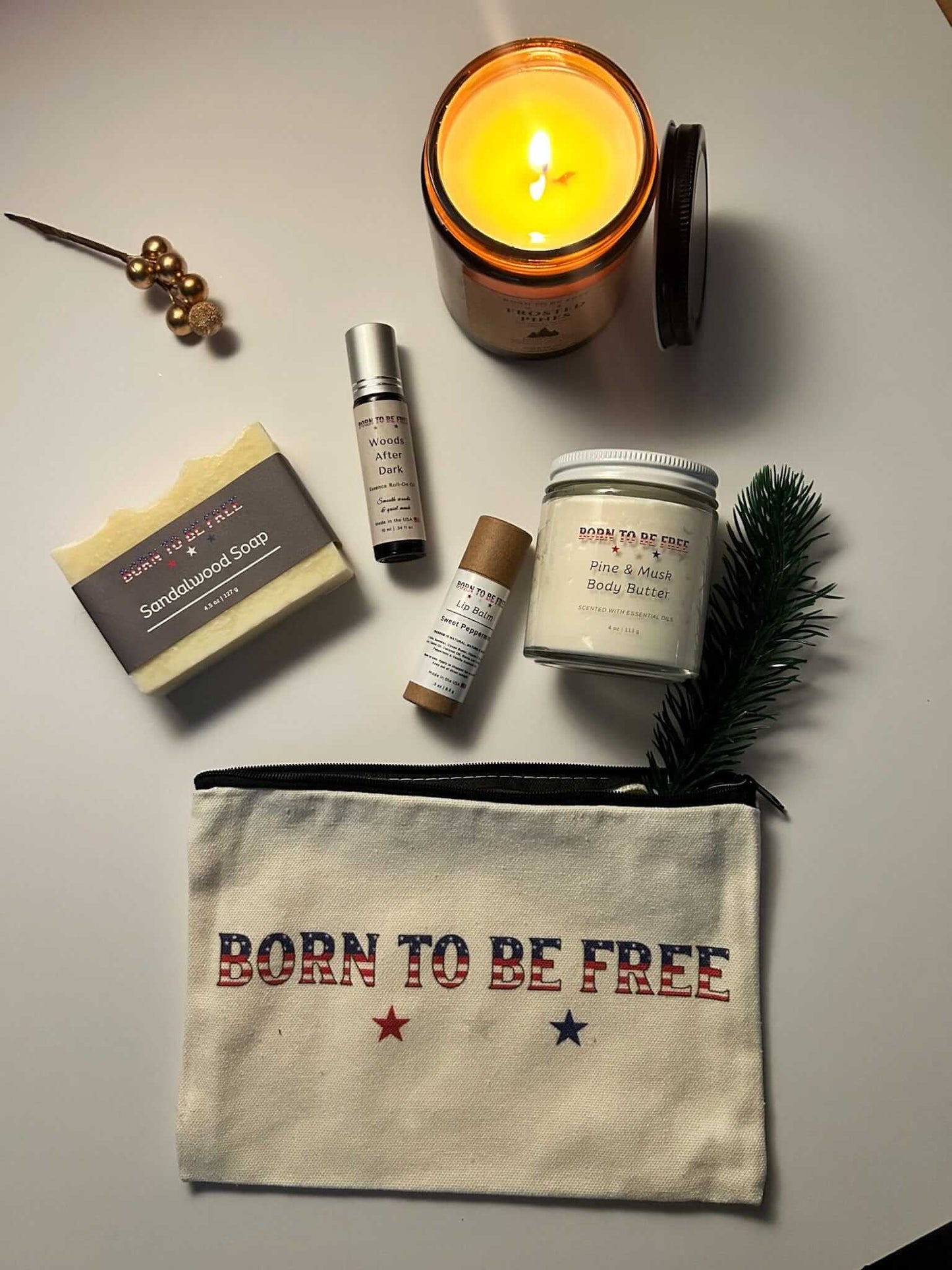 Close-up of Winter Woods Holiday Bundle arranged with pine, sandalwood, and clean handcrafted products for cold-weather hydration.