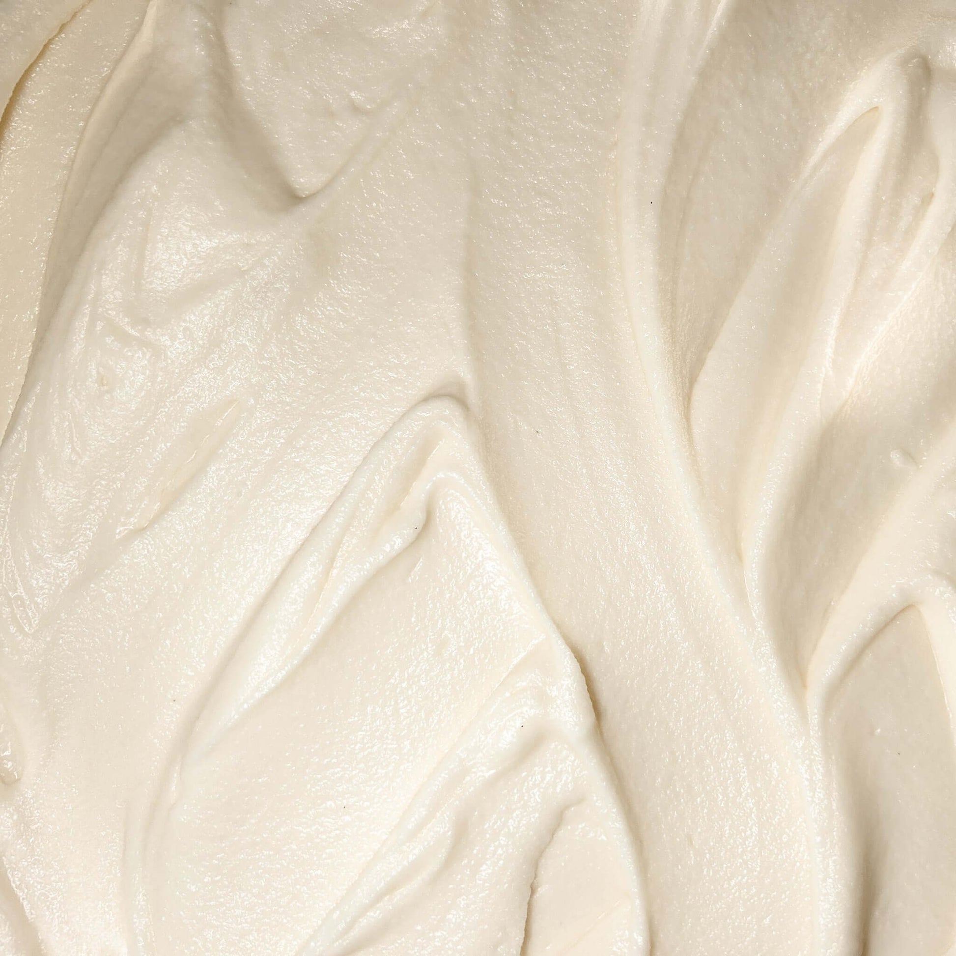 Pumpkin Spice Body Butter, Sandalwood Body Butter Close-up of rich, creamy texture of Pine & Musk Body Butter, showcasing its luxurious whipped consistency.