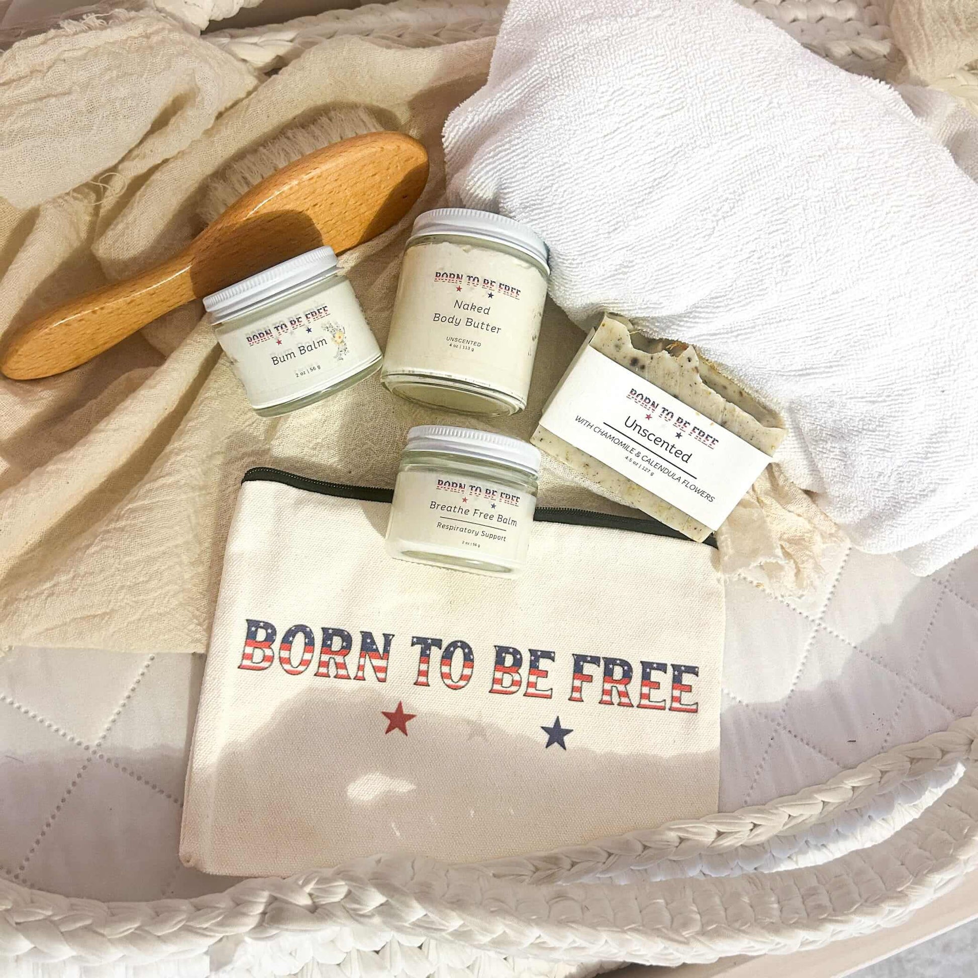 Baby Essentials Bundle- Non Toxic Baby Care products including body butter, bath balm, and a natural brush.
