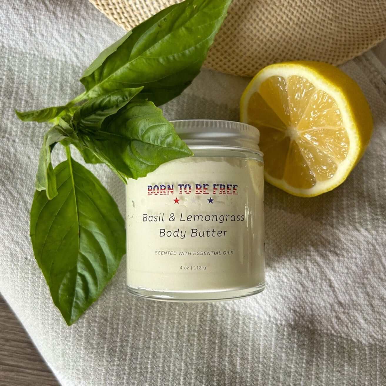 Basil & Lemongrass Body Butter in glass jar on white background