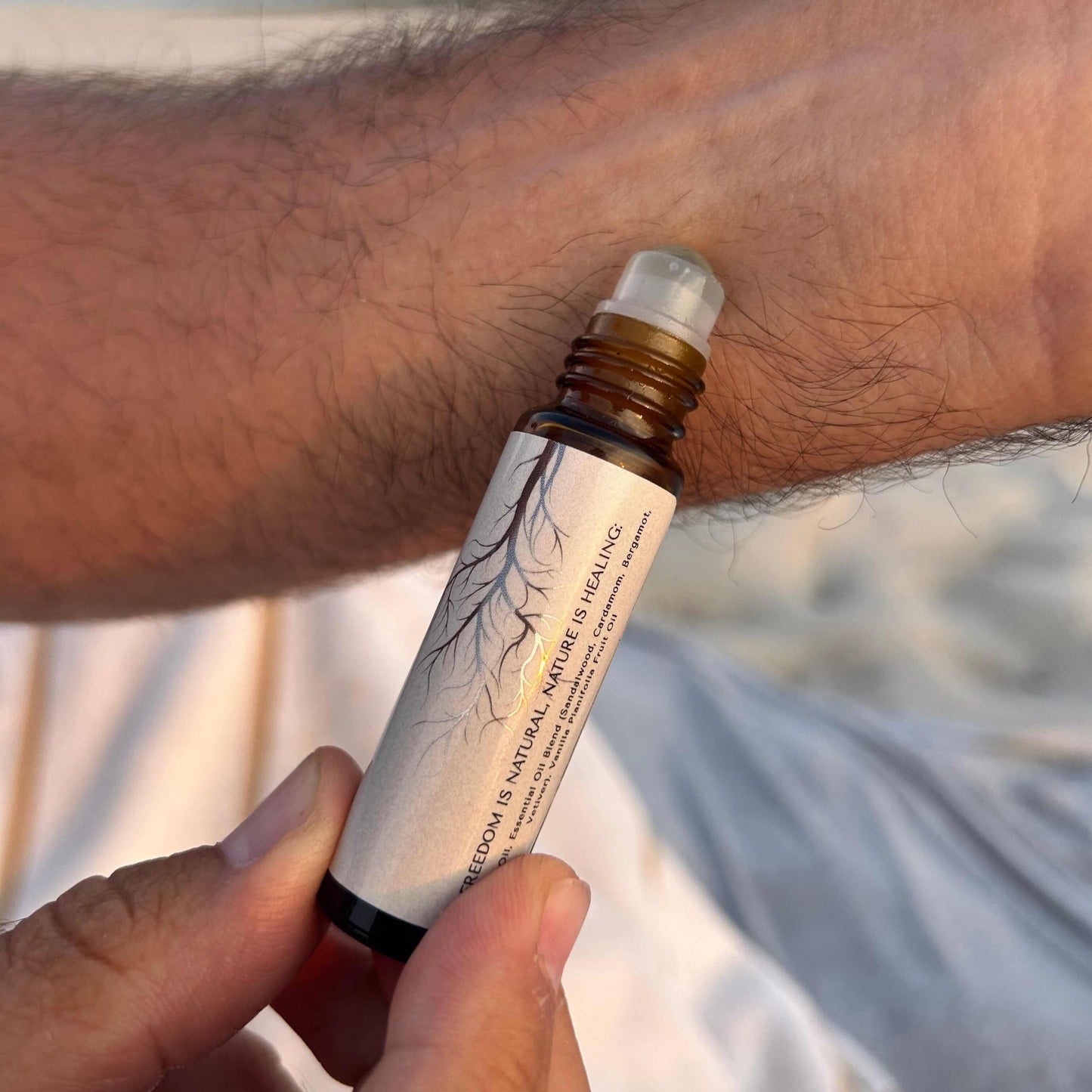 grounding earthy roll on fragrance with essential oils Rooted in Nature Essence Roll-On Oil