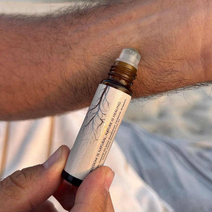 grounding earthy roll on fragrance with essential oils Rooted in Nature Essence Roll-On Oil