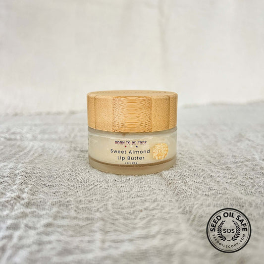 Sweet Almond Tallow Lip Butter in a jar with a bamboo lid, designed for deep lip hydration and care.
