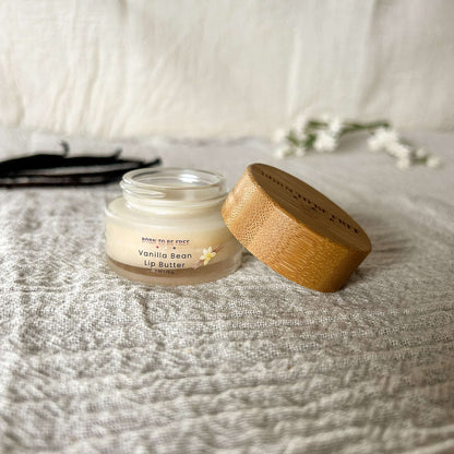 Vanilla Bean Tallow Lip Butter in a jar with a bamboo lid, designed for moisturizing and soothing dry lips.